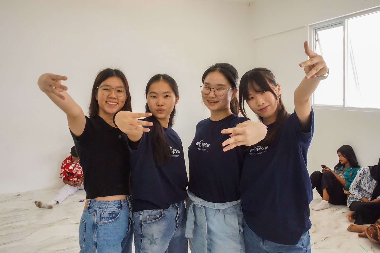 Four EclipseLearns volunteers together at a visit