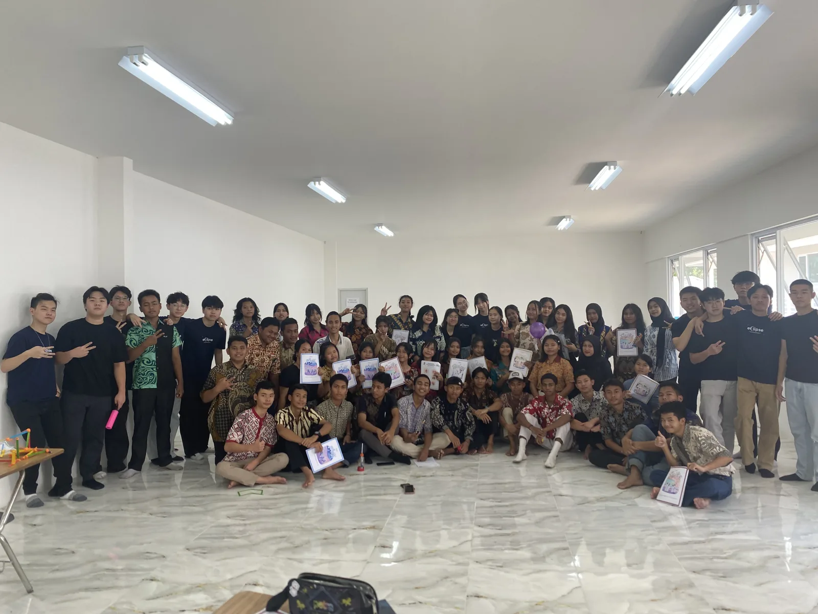 EclipseLearns volunteers and children gathered after an activity